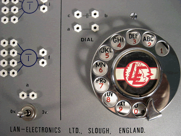 Rotary telephone dial (notice the letters missing?