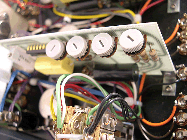  image of Some trim knobs inside the unit. 