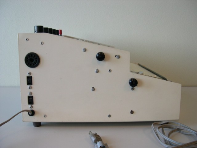 image of Left side; power cord & paperfeed knobs are on this side. 