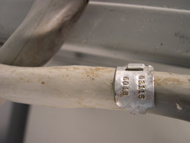  image of A metal tag on the cable. 