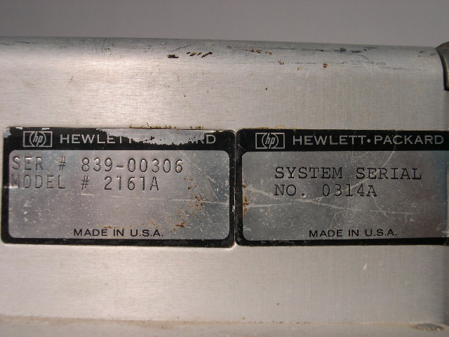  image of The serial number plates on the power supply. 