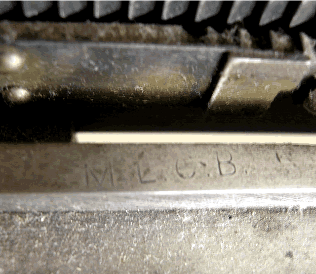 Letters etched into top left back of the Type 001.
