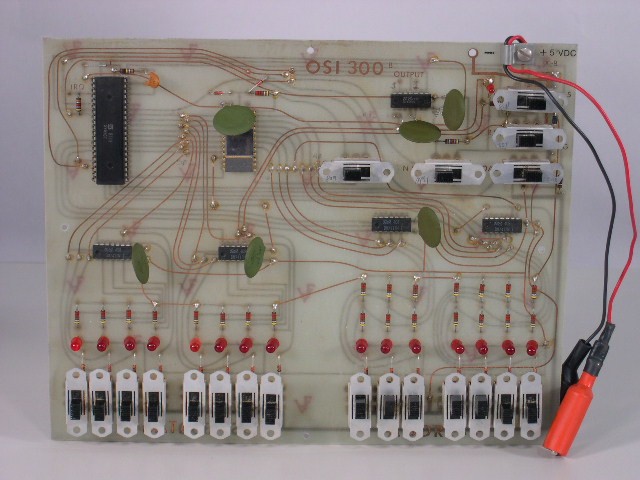  image of Front view.  Note power connections on right in red & black. 